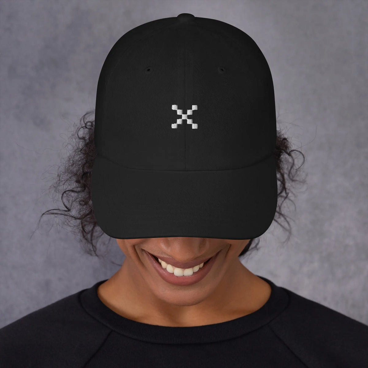 X Dad Cap in black, front view